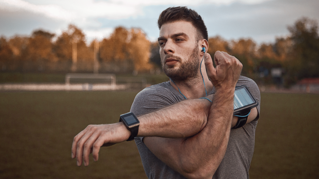 a man stretching after training